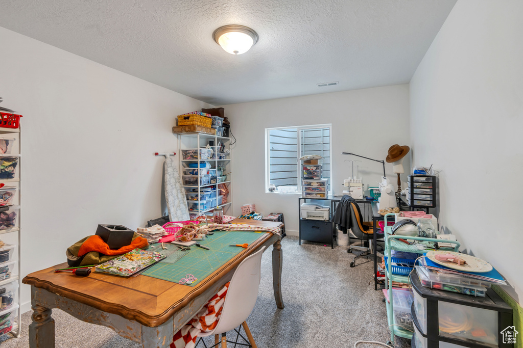 Office with a textured ceiling