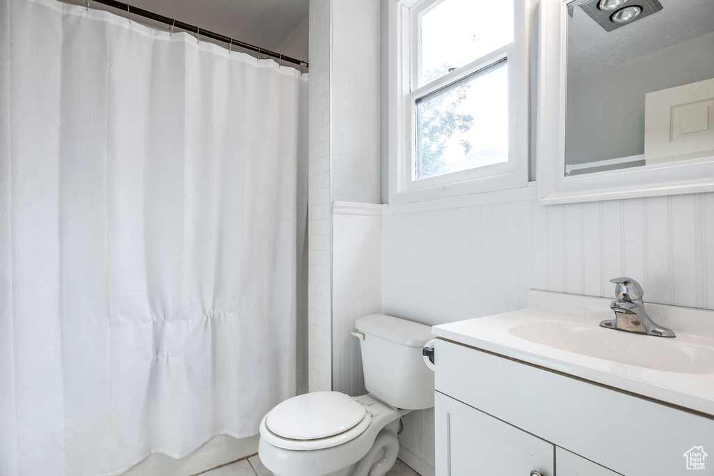 Bathroom with vanity and toilet