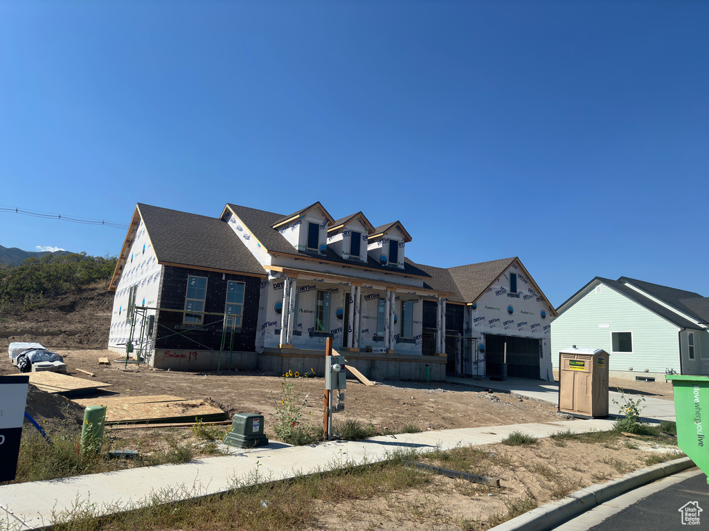 View of front of property with covered porch