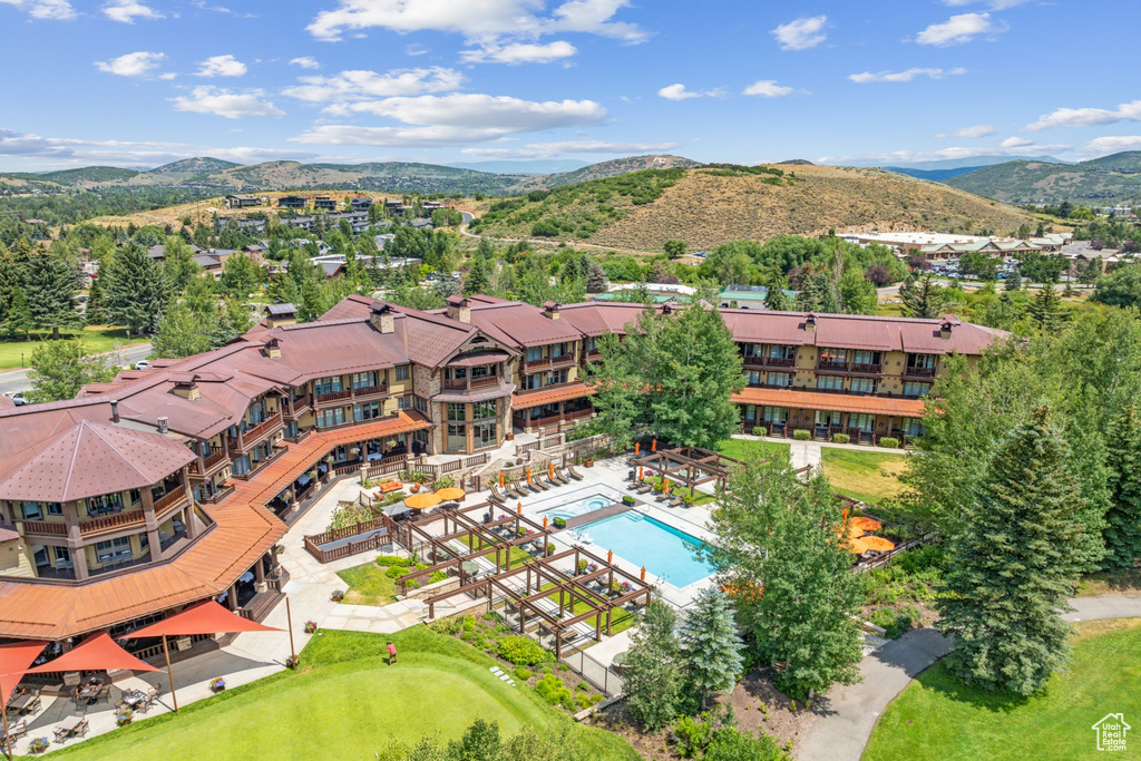 Birds eye view of property featuring a mountain view