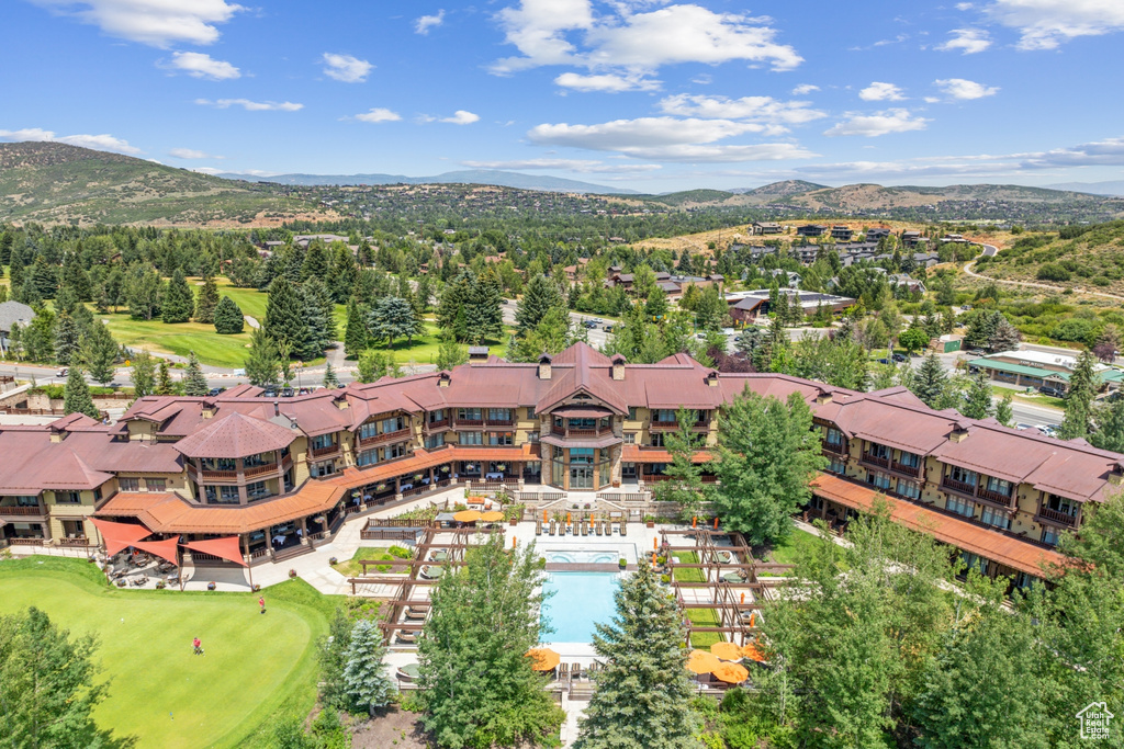 Birds eye view of property with a mountain view