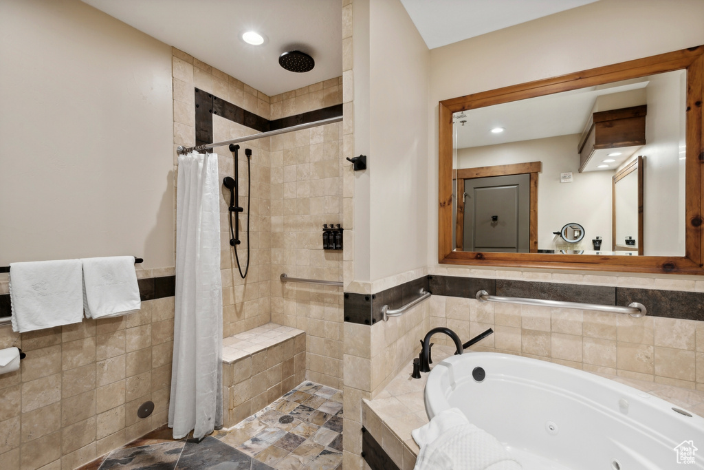 Bathroom with shower with separate bathtub