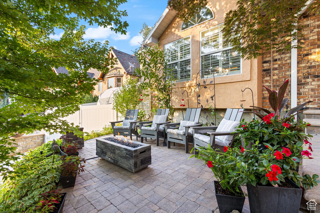 View of patio / terrace with an outdoor fire pit