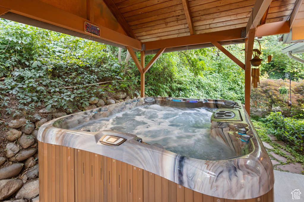 View of patio / terrace featuring a hot tub