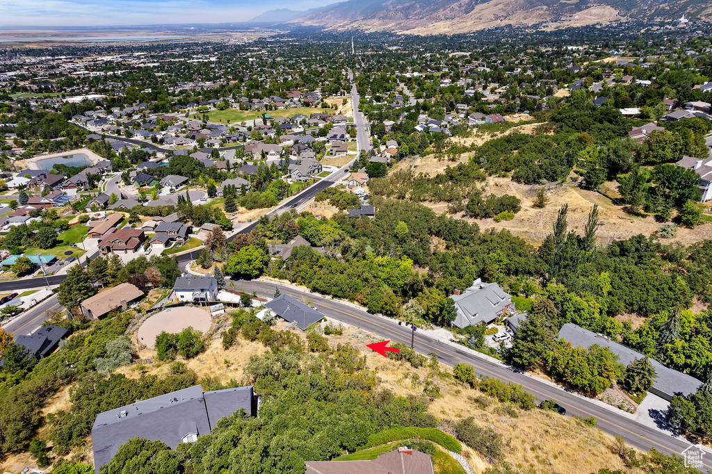 Birds eye view of property featuring a mountain view