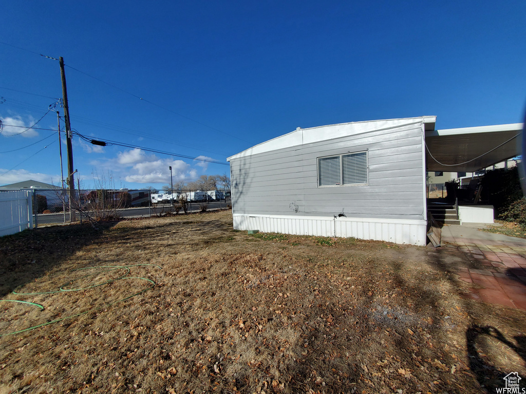 Exterior space with a carport