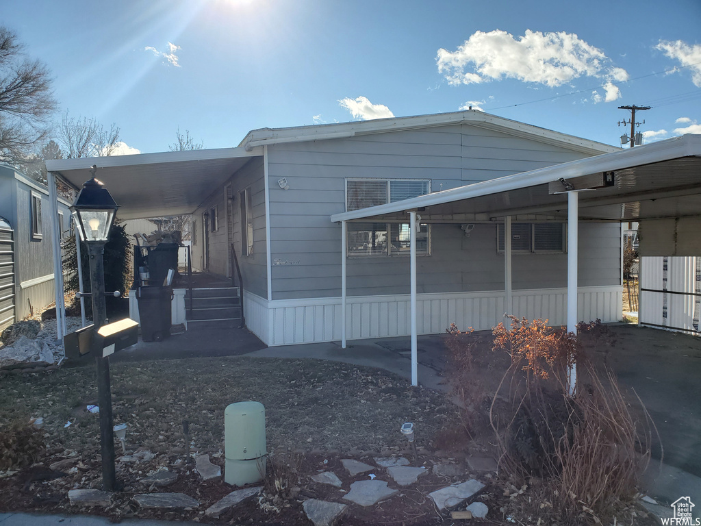 Exterior space with a carport