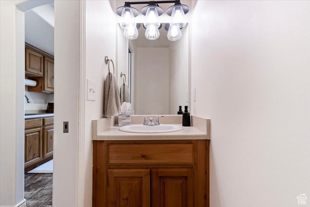 Bathroom with vanity and tile patterned flooring