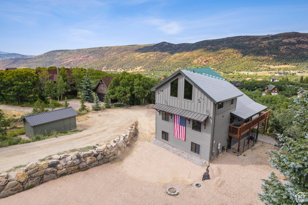 Birds eye view of property featuring a mountain view