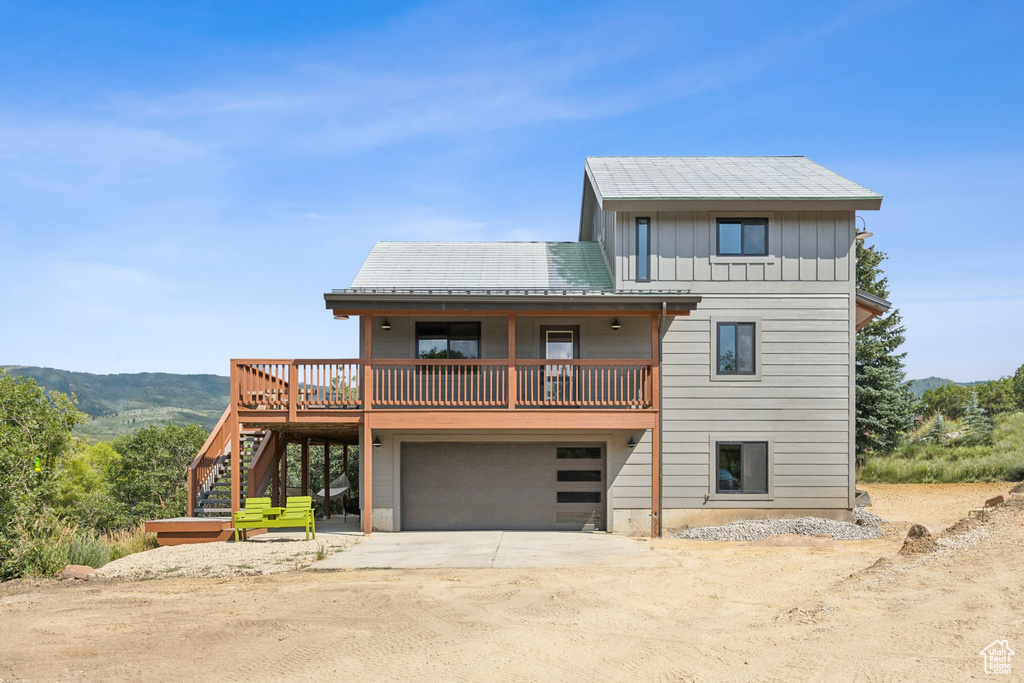 View of front of property featuring a garage