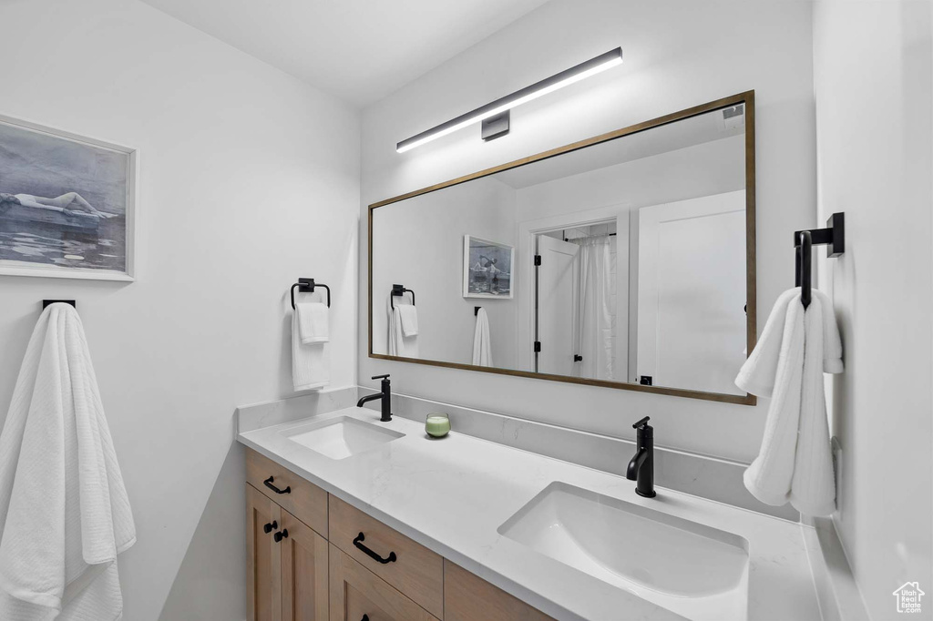 Bathroom featuring double sink vanity