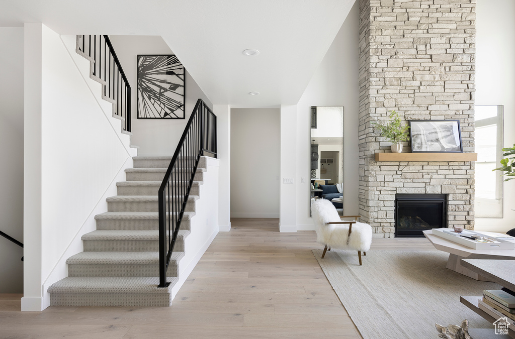 Interior space featuring a fireplace and light wood-type flooring