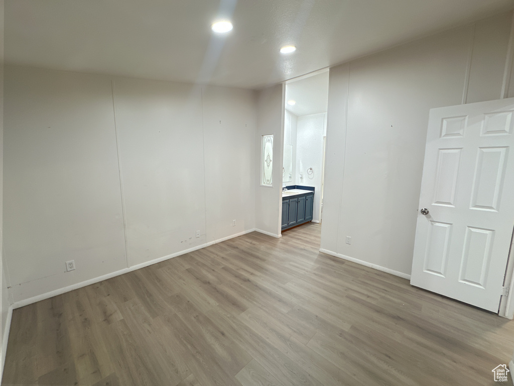 Empty room featuring light hardwood / wood-style flooring