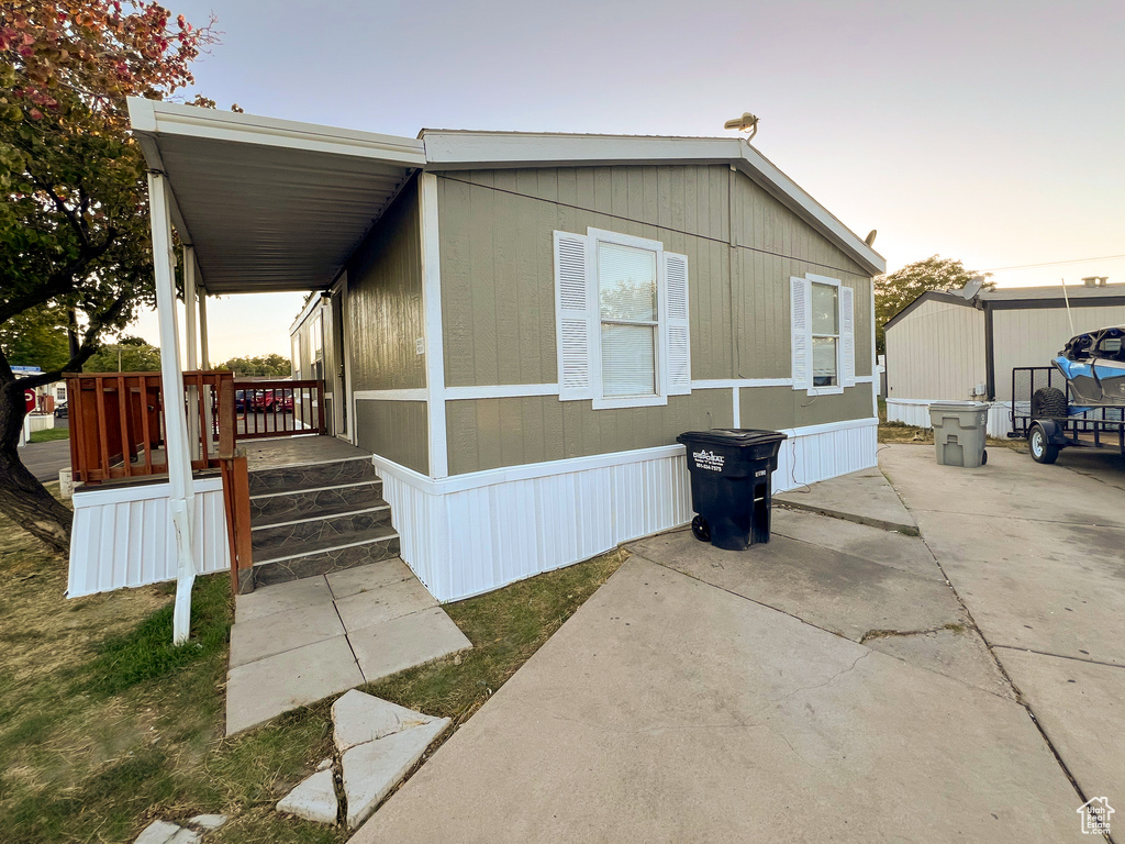 View of front of house with covered porch