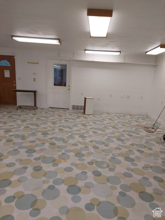 Interior space with tile patterned flooring