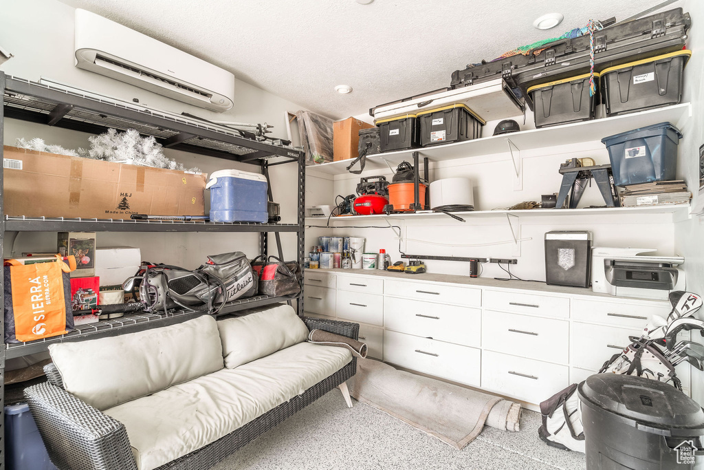 Storage area with a wall mounted air conditioner