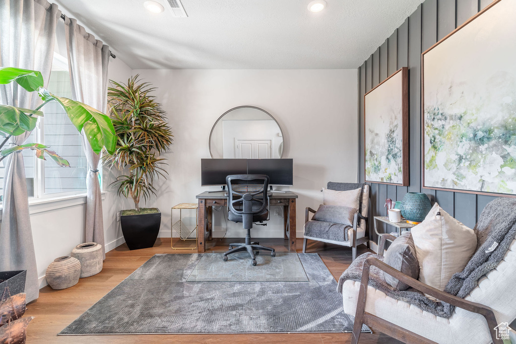 Office area featuring light hardwood / wood-style flooring