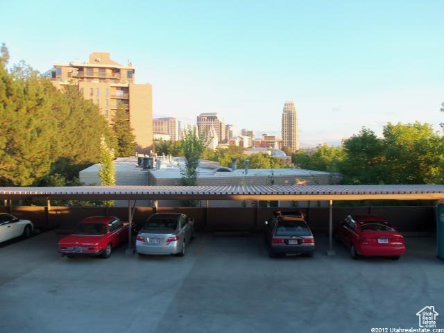 View of vehicle parking with a carport