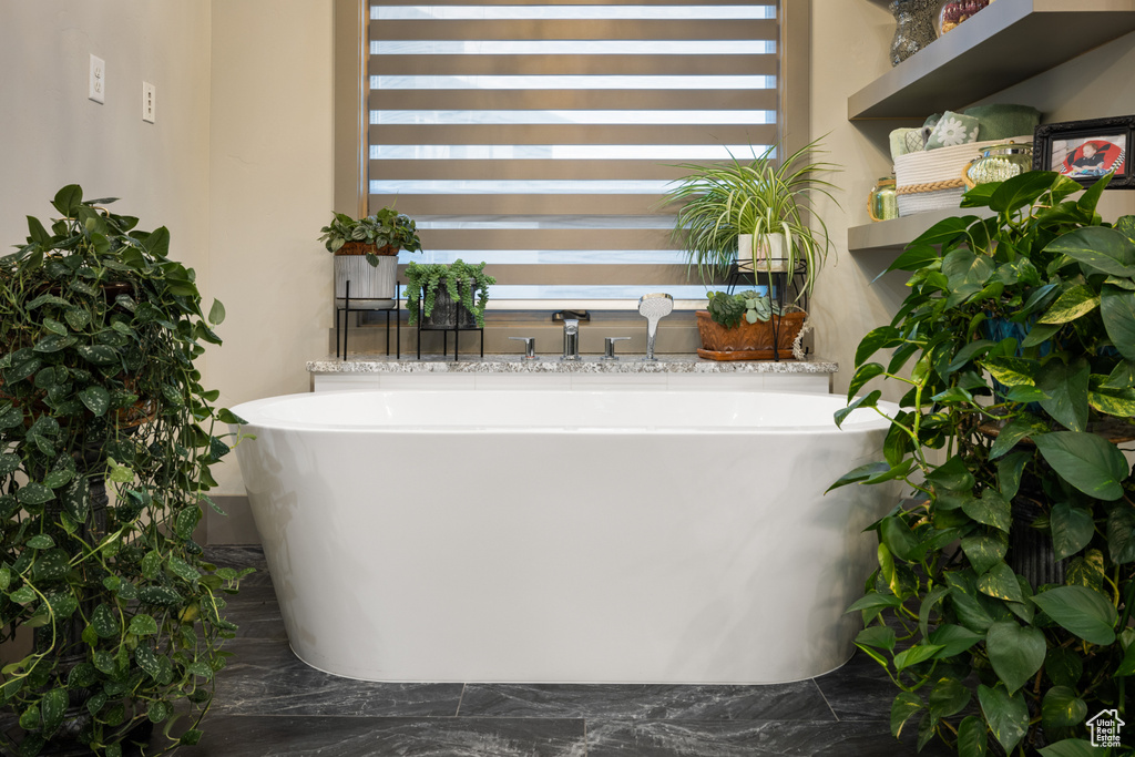 Exterior space with a freestanding tub