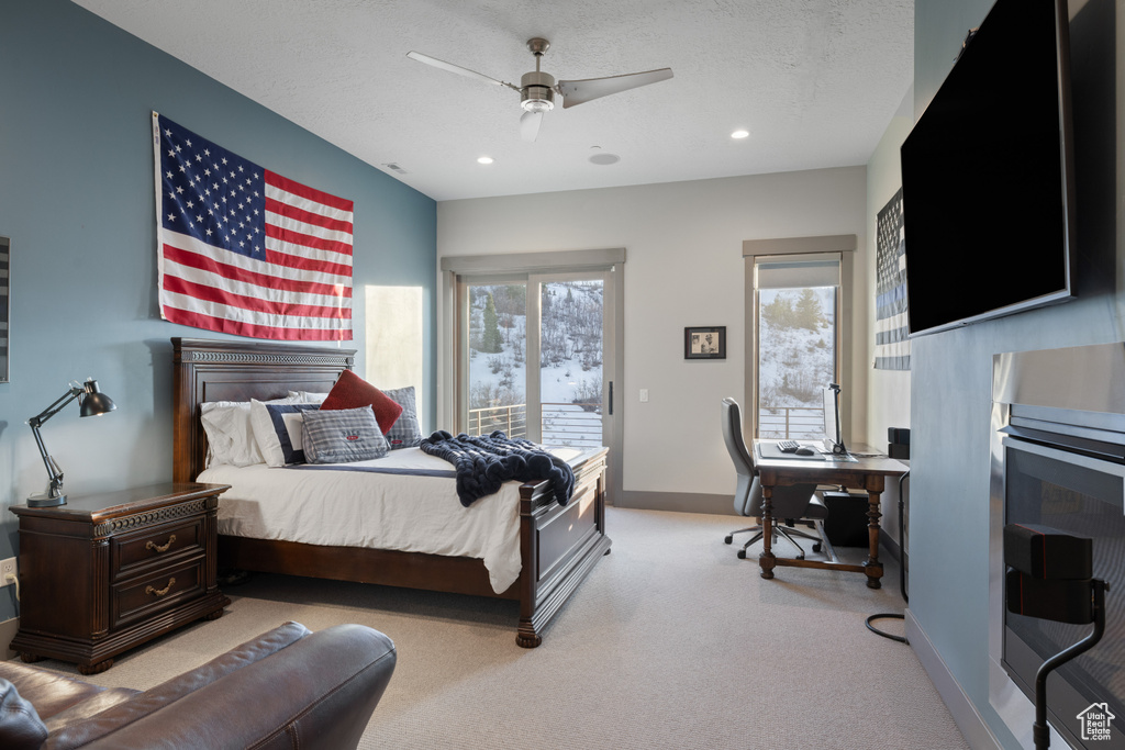 Carpeted bedroom with baseboards, access to outside, recessed lighting, and a ceiling fan