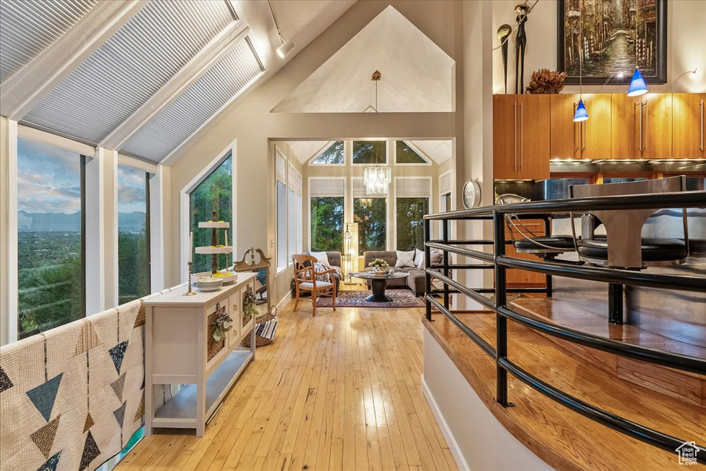 Interior space featuring vaulted ceiling and light wood-type flooring