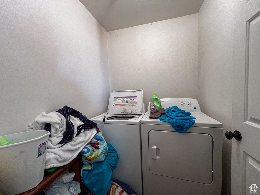 Laundry room featuring washing machine and dryer