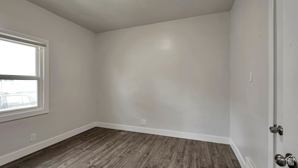 Spare room featuring hardwood / wood-style floors