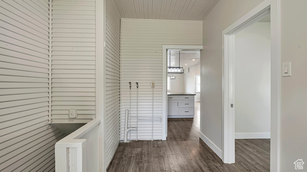 Corridor with dark wood-type flooring