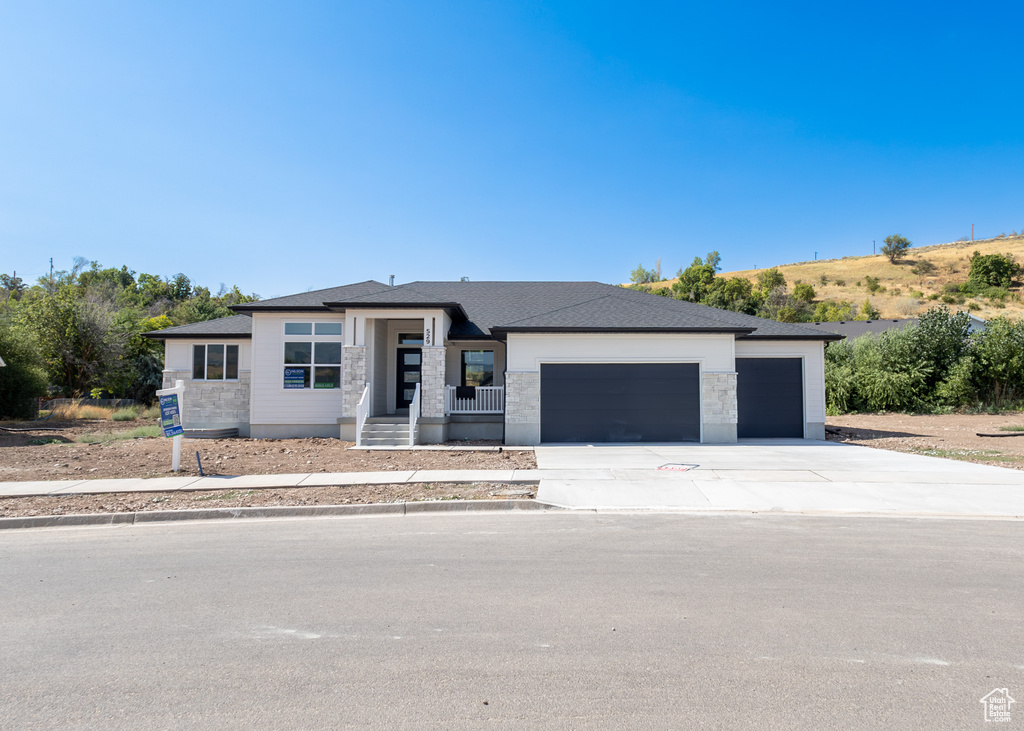 Prairie-style house with a garage