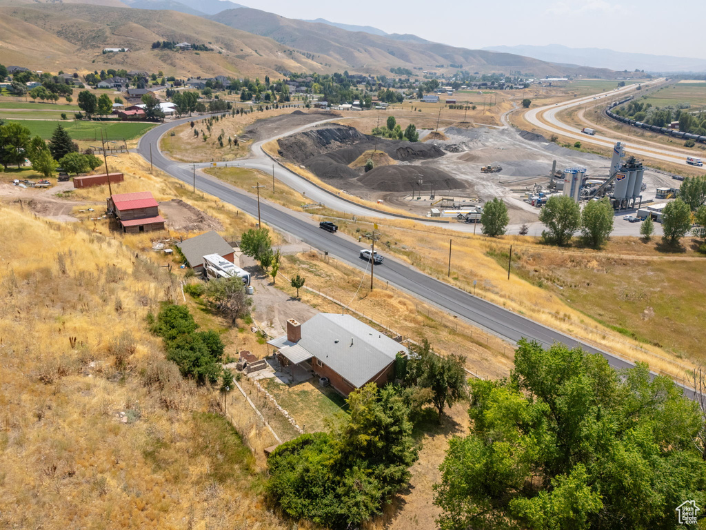 Birds eye view of property with a mountain view and a rural view