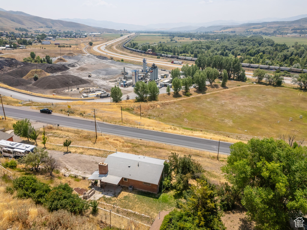 Drone / aerial view with a mountain view and a rural view