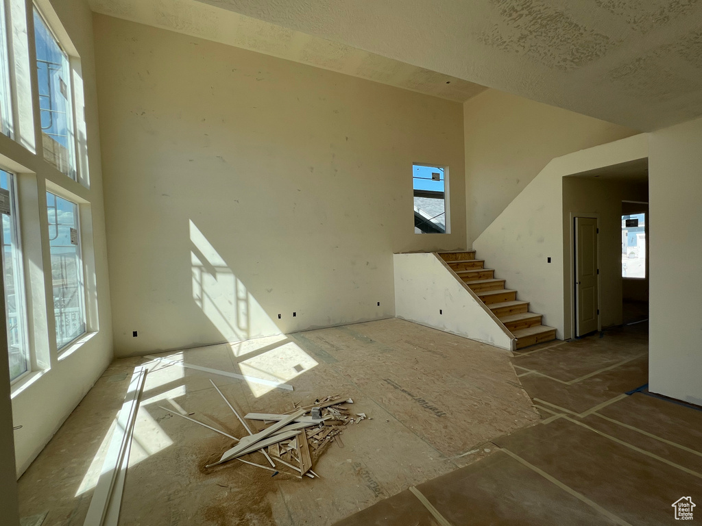 Interior space featuring a high ceiling