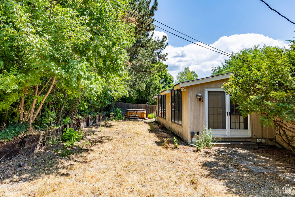 View of yard with an outdoor structure