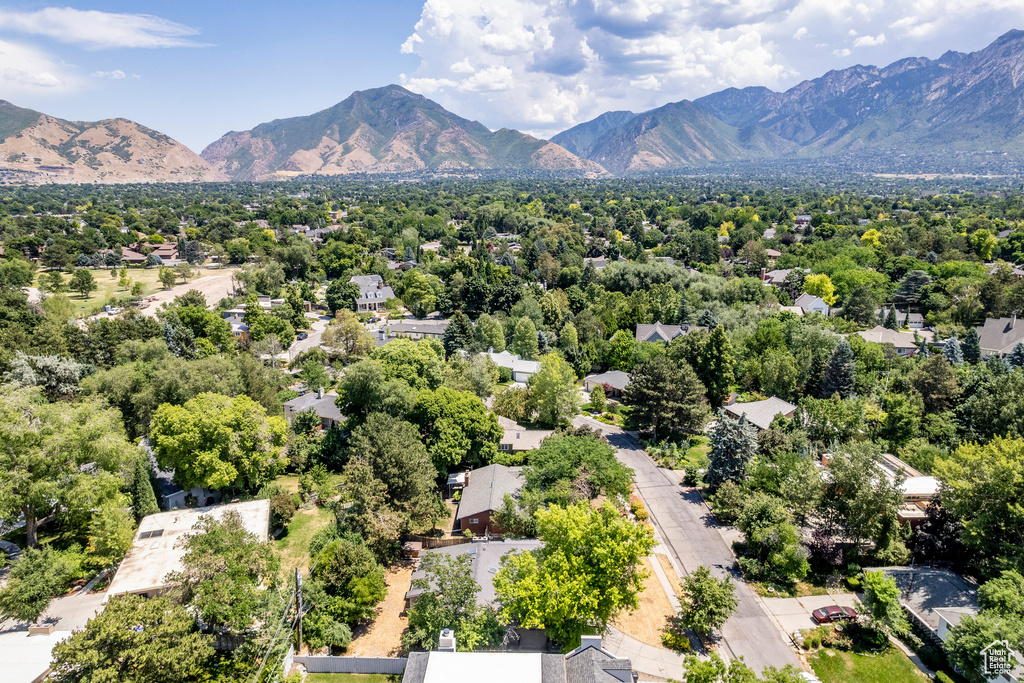 Birds eye view of property with a mountain view