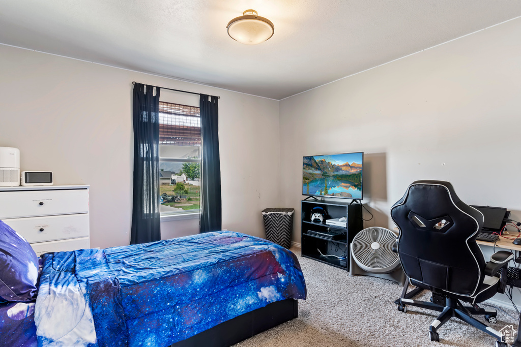 View of carpeted bedroom