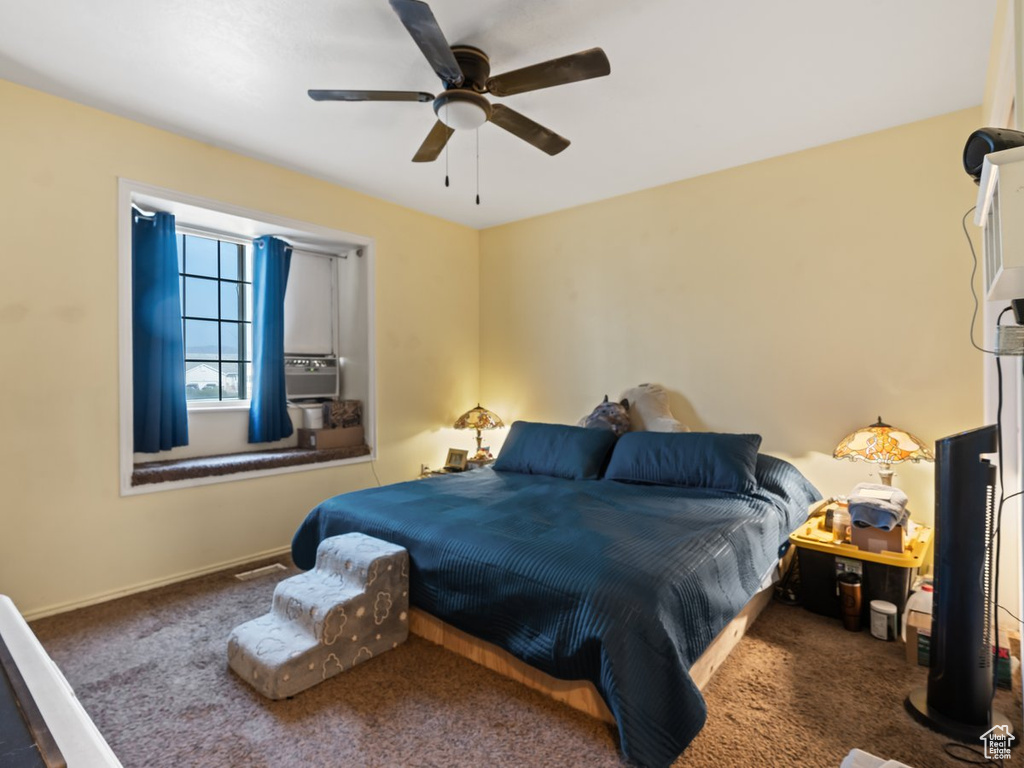 Bedroom with carpet floors and ceiling fan