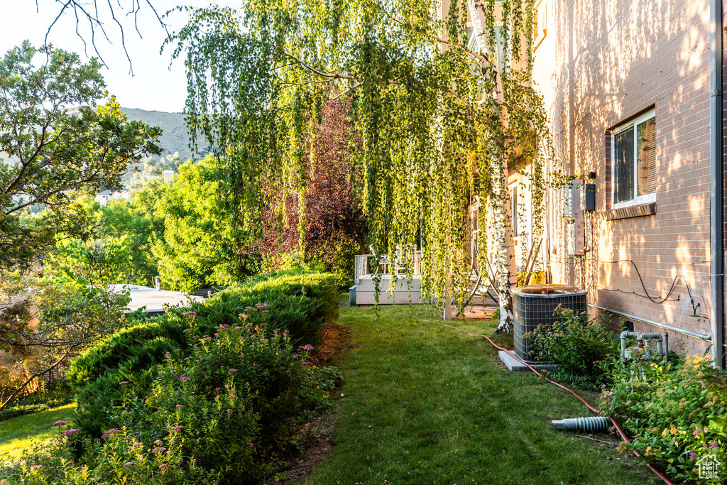 View of yard featuring central AC