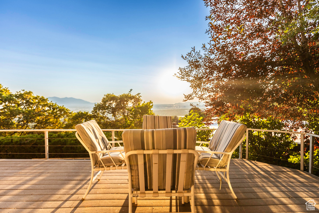 Wooden deck featuring a mountain view