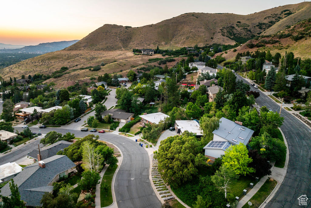 Aerial view at dusk featuring a mountain view