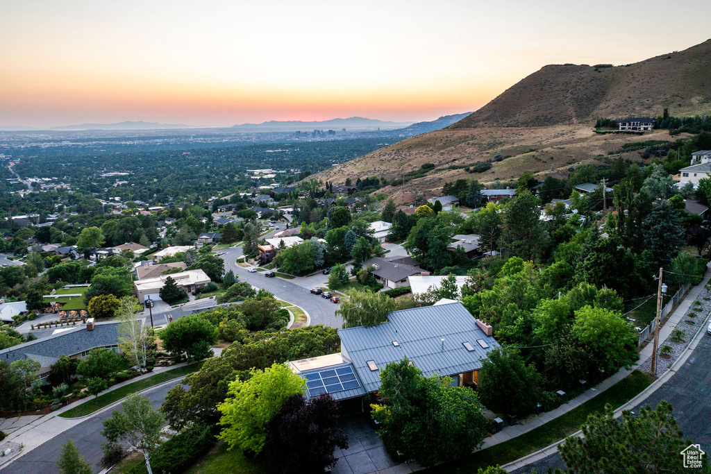 Aerial view at dusk featuring a mountain view