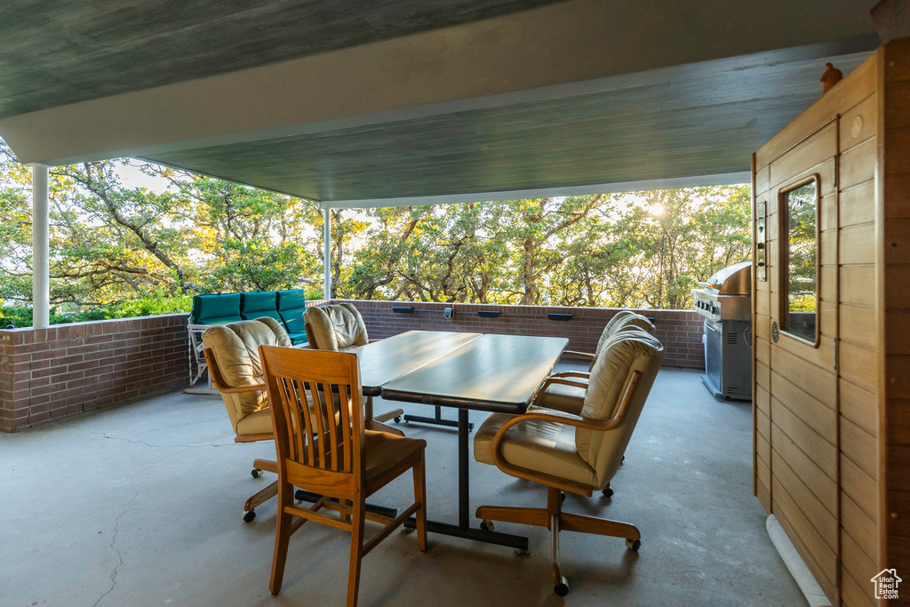 View of patio / terrace with grilling area and an outdoor hangout area