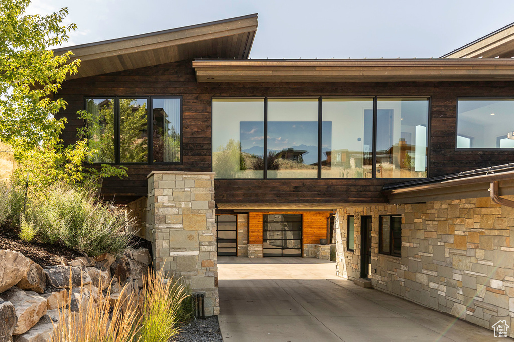 Rear view of house with a patio