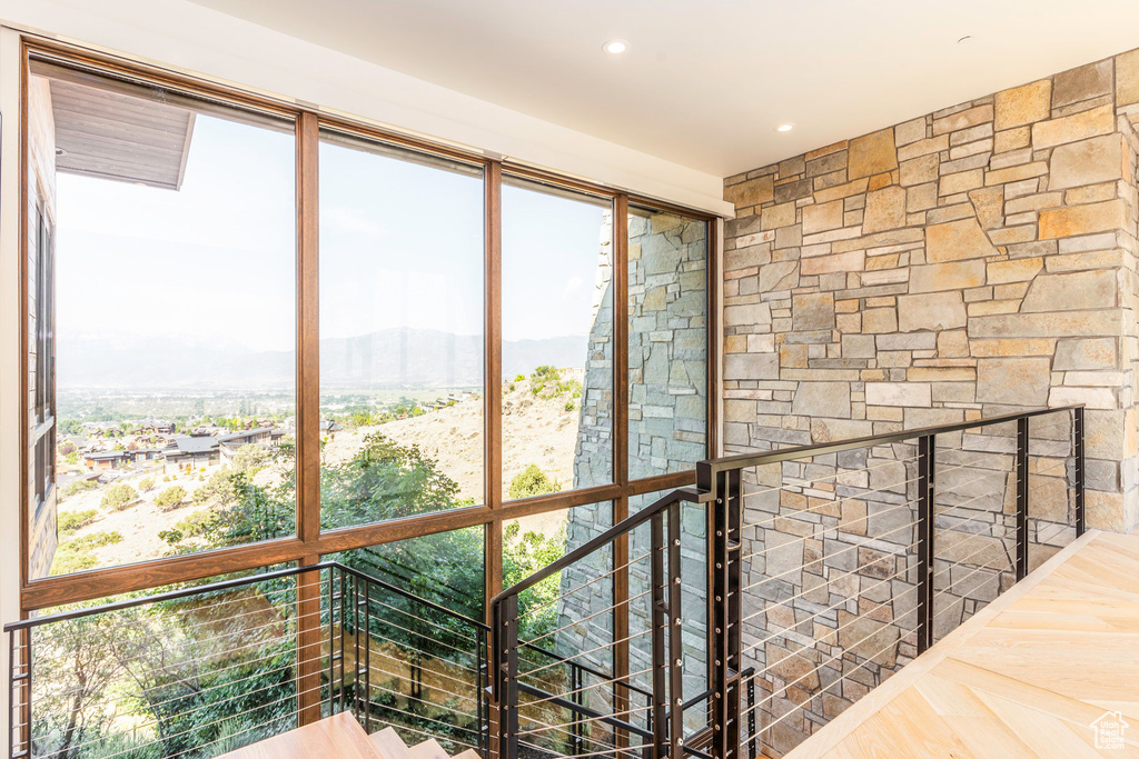 Hallway featuring parquet floors and a mountain view