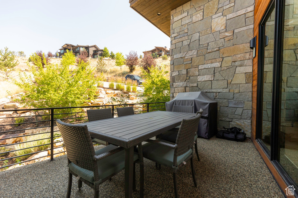 Balcony featuring area for grilling