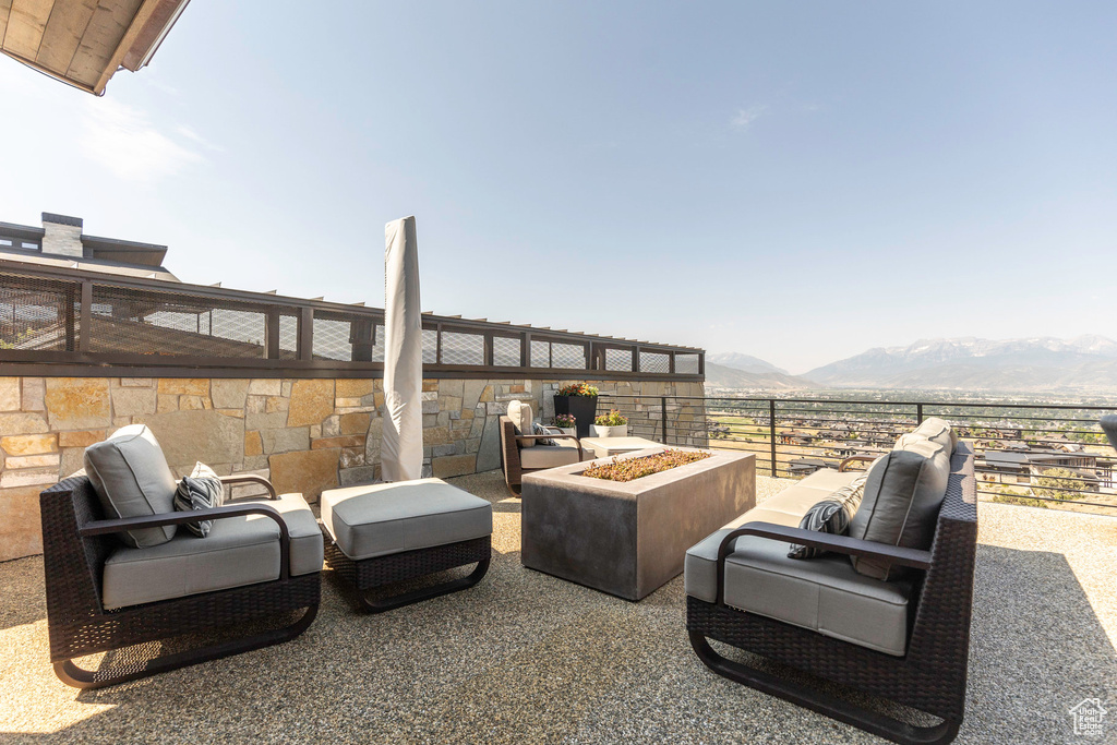 View of patio / terrace with a mountain view