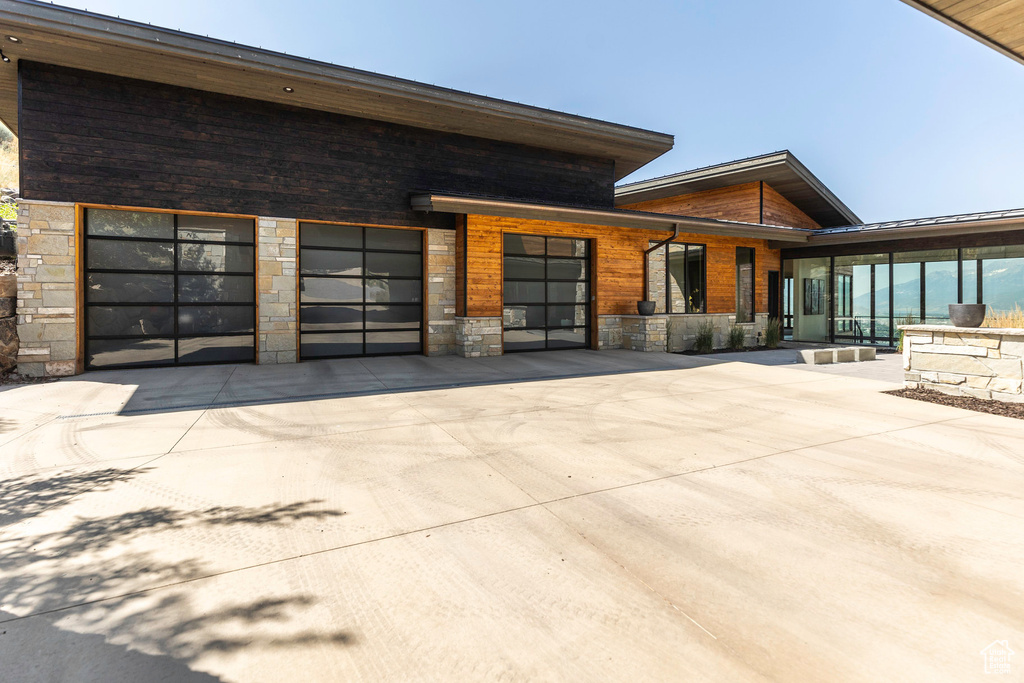 Exterior space featuring a garage