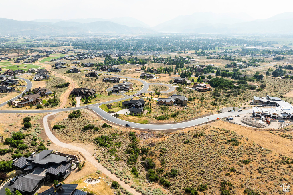 Birds eye view of property featuring a mountain view