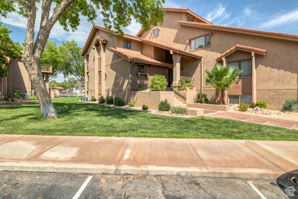 View of front of home with a front yard