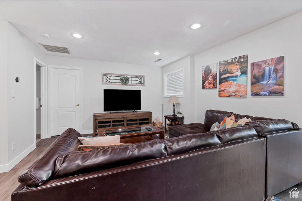 Living room featuring wood-type flooring