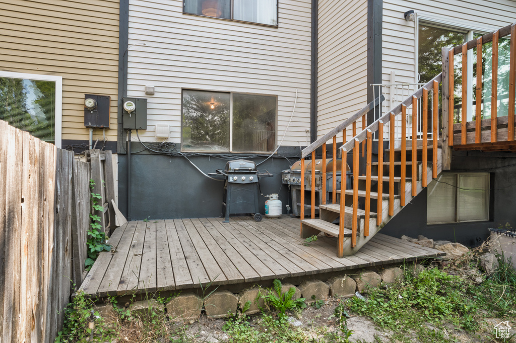 Wooden deck featuring grilling area